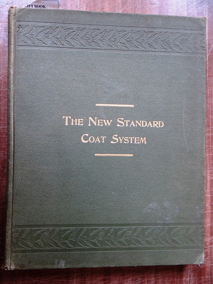 Item #133165 The New Standard Coat System: A Short-Measure Method of Drafting every kind of Coat for every Size and Shape. A Complete Treatise on the Art and Science of Coat Cutting. Jno. J. Mitchell Co.