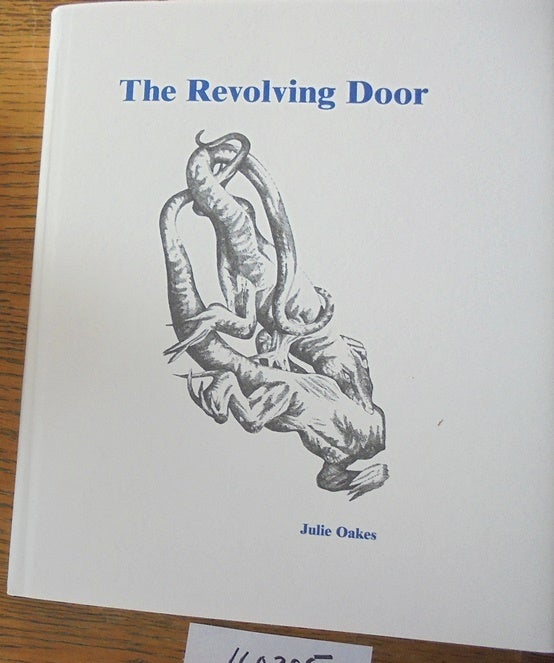 Item #160395 The Revolving Door. Julie Oakes.